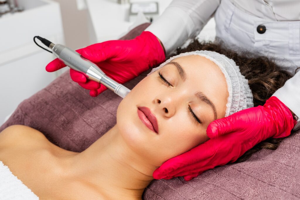 Beautiful woman receiving microneedling rejuvenation treatment. Mesotherapy. | Timeless laser in Denver CO